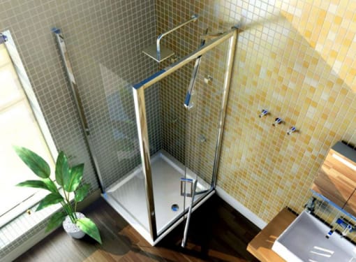 A chrome infold shower enclosure