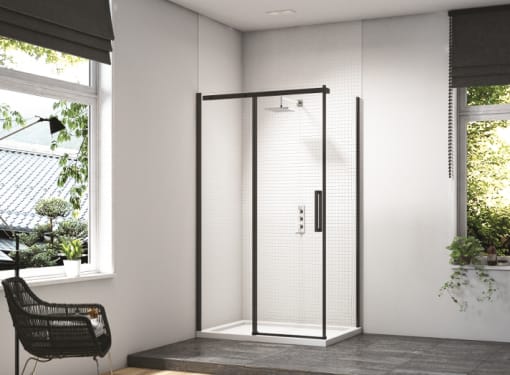 A matt black inline sliding shower door with end panel 